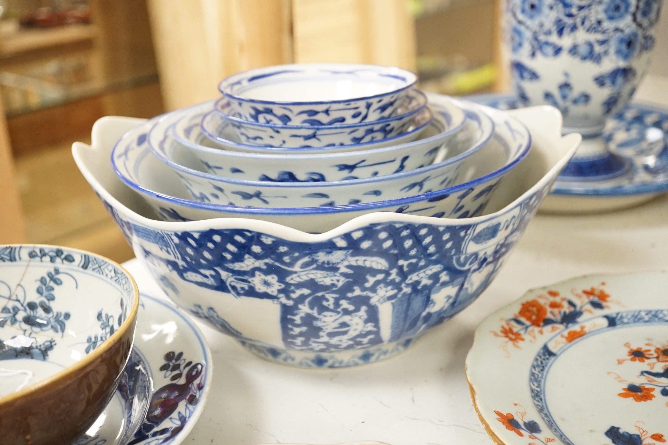 An assortment of Chinese porcelain tin-glazed earthenware charger and a Delft vase